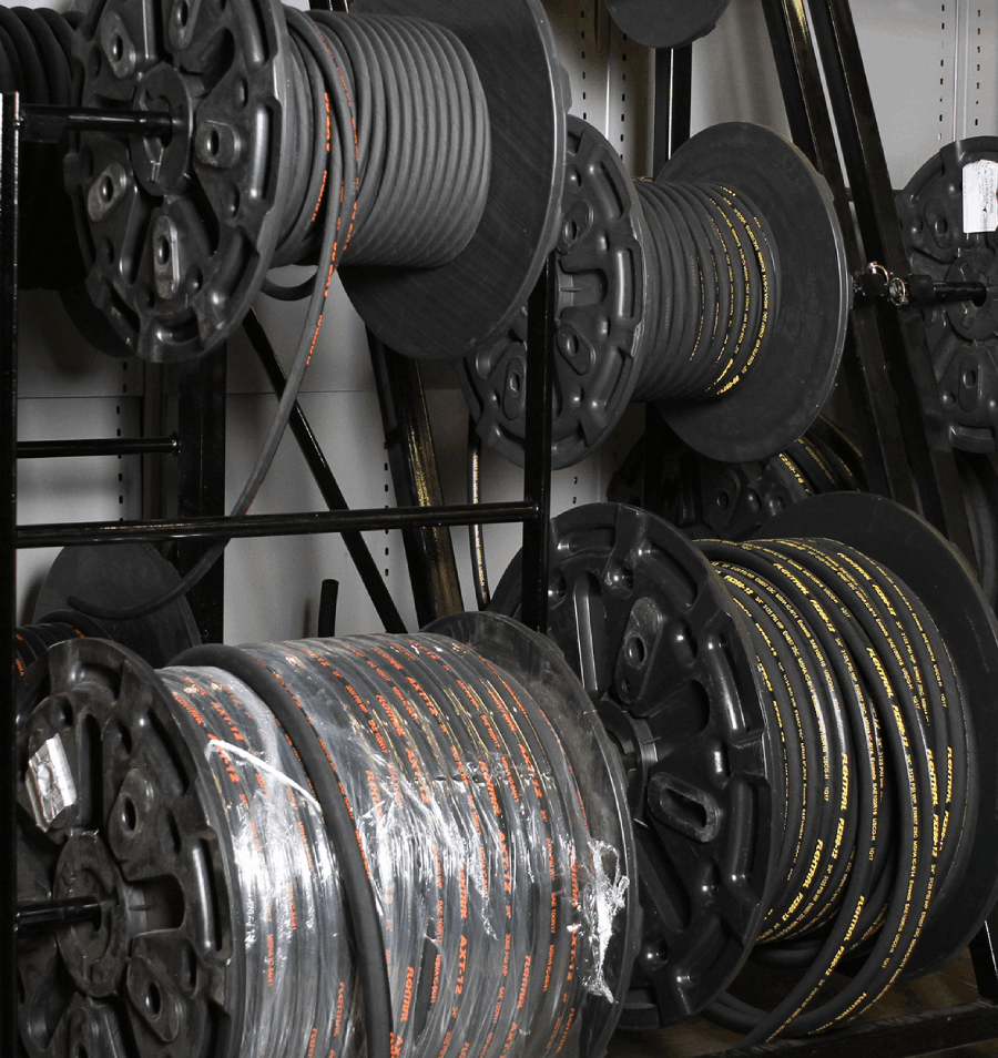 Multiple hoses wrapped around spools